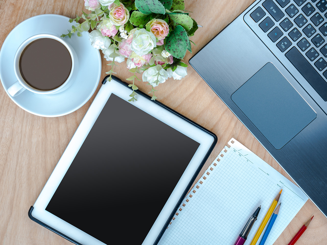 Worktable-with-laptop,-tablet-&-cup-of-coffee-business-conceptual